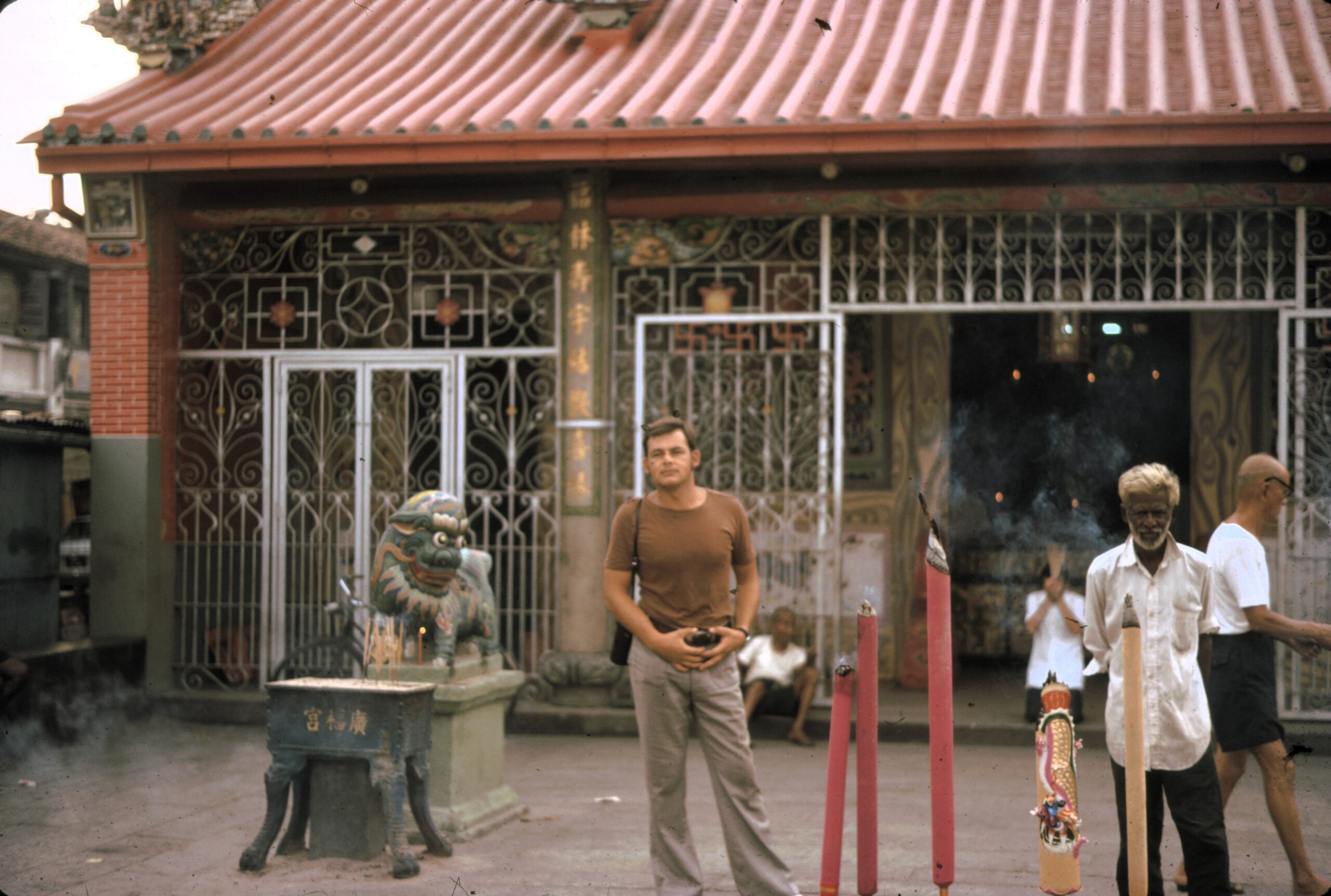 Albrecht at a temple with a companion in Penang, Malaysia, 1973