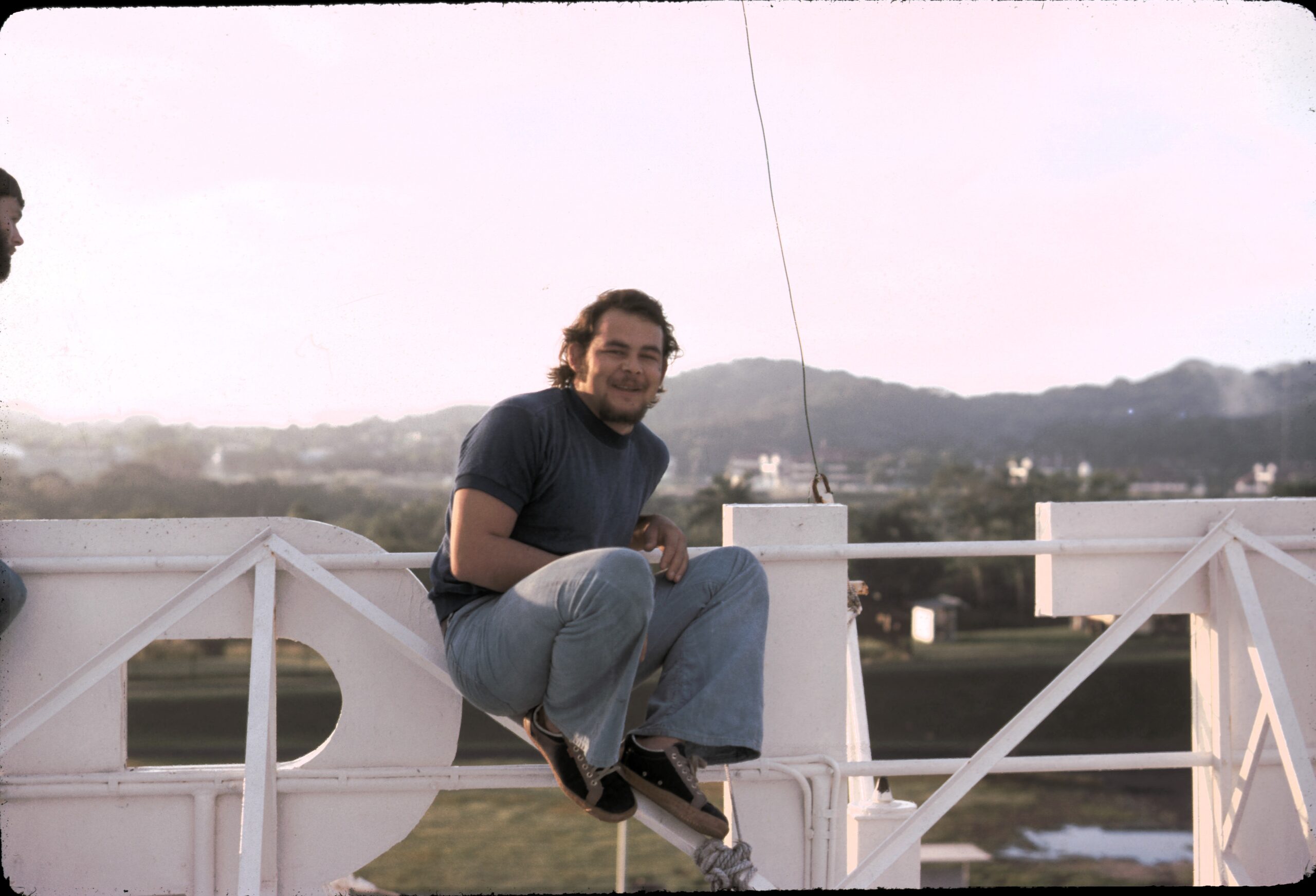 Albrecht, at the very top of the ship to see as much as possible about the Panama Canal, 1974